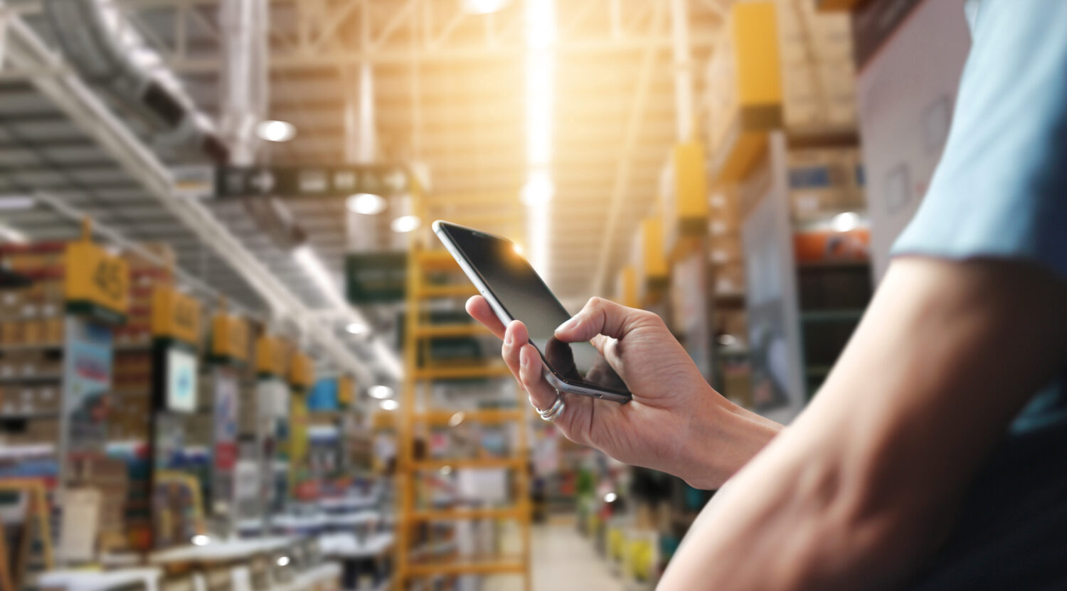 Man on phone in warehouse