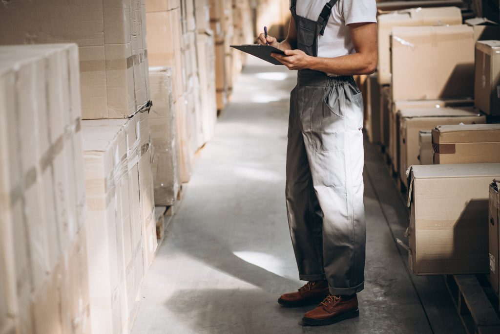 image of a warehouse worker managing safety stock